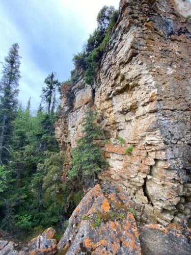 A towering limestone cliff near Lake Athapapuskow.