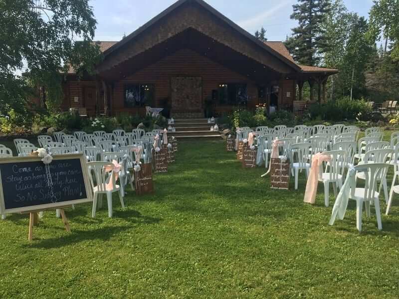 An outdoor ceremony set up at Bakers Narrows, one of the unique wedding venues in Manitoba.
